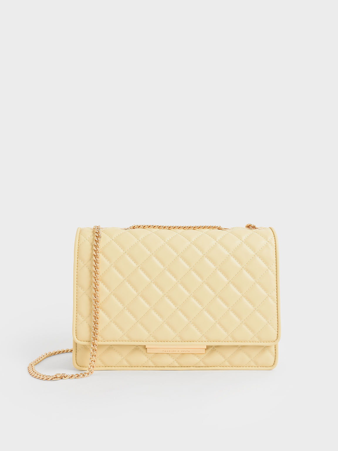 Double chain outlet strap bag