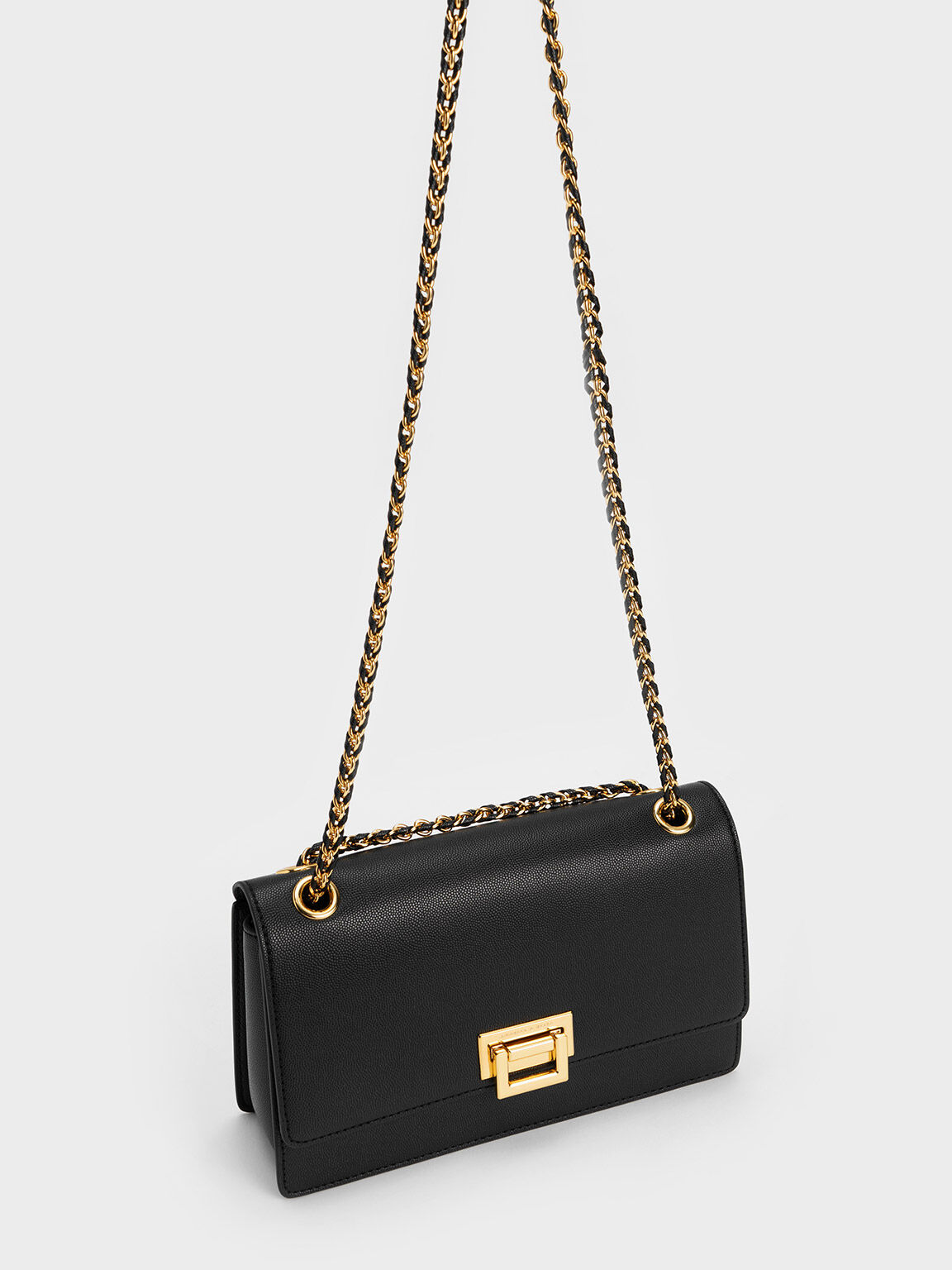 Black Metallic Accent Front Flap Bag CHARLES KEITH SA