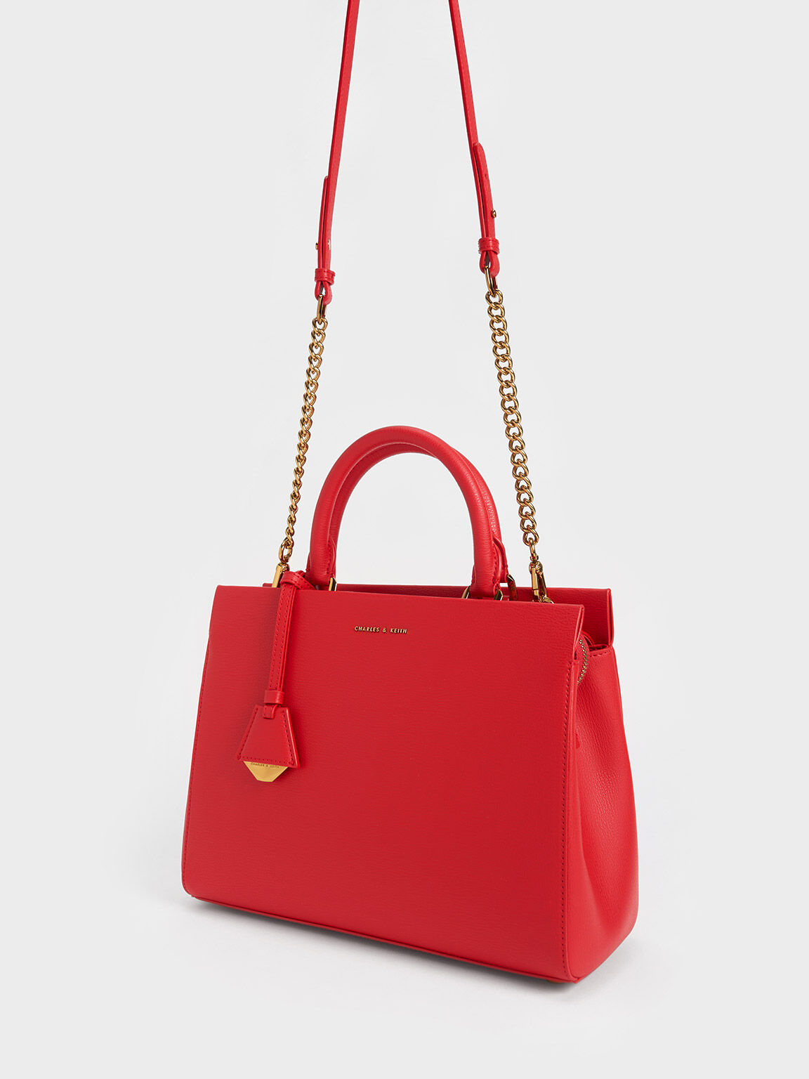 حقيبة كلاسيكية بتصميم هندسي, أحمر, hi-res