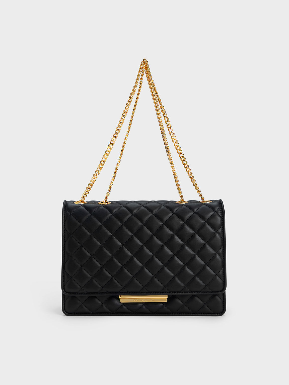 Black Push Lock Quilted Crossbody Bag CHARLES KEITH SA