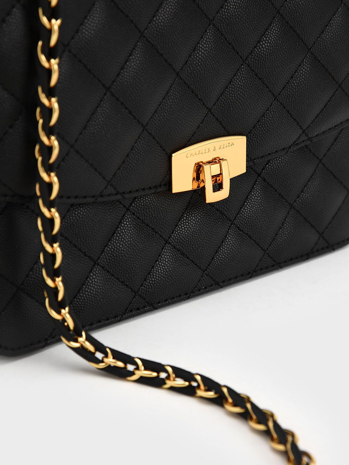 Quilted push online lock bag