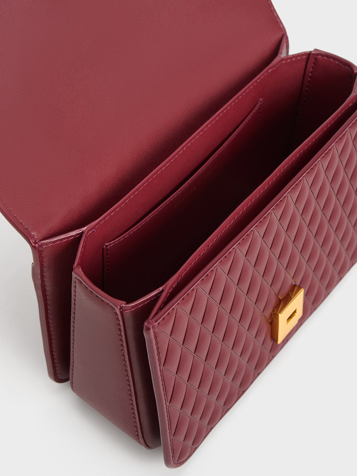 Burgundy Quinlynn Metallic Accent Quilted Bag CHARLES KEITH SA