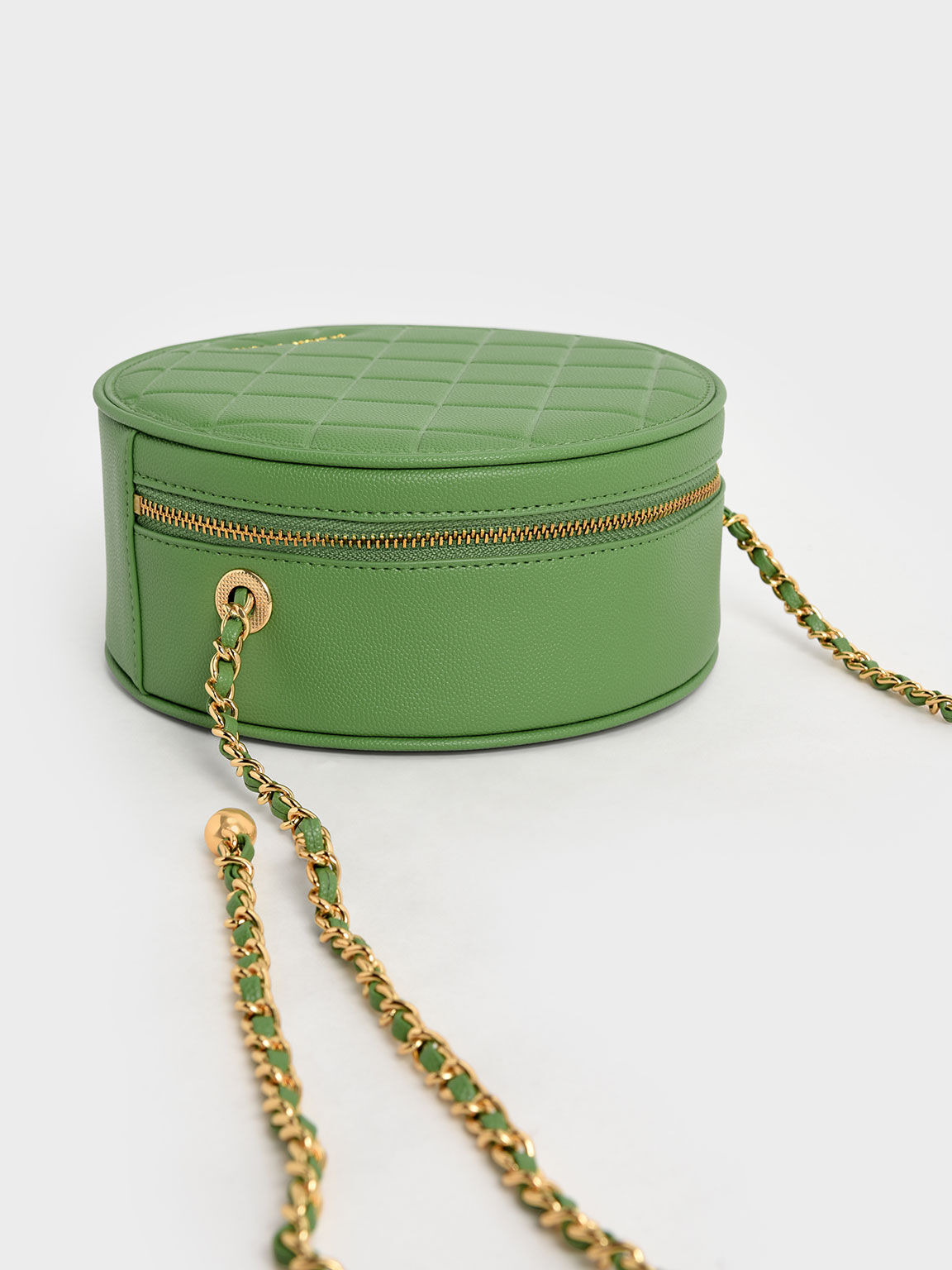 حقيبة دائرية مبطنة, لون أخضر, hi-res