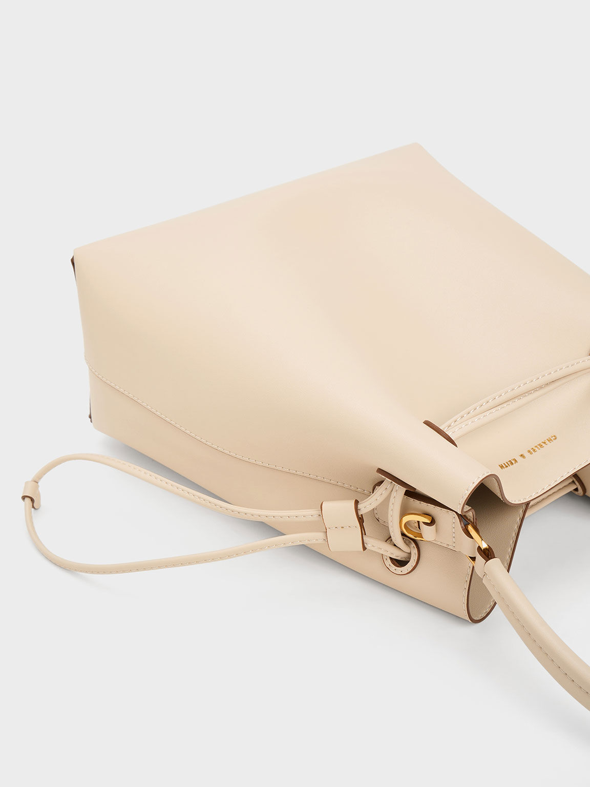 Charles and keith beige bag store