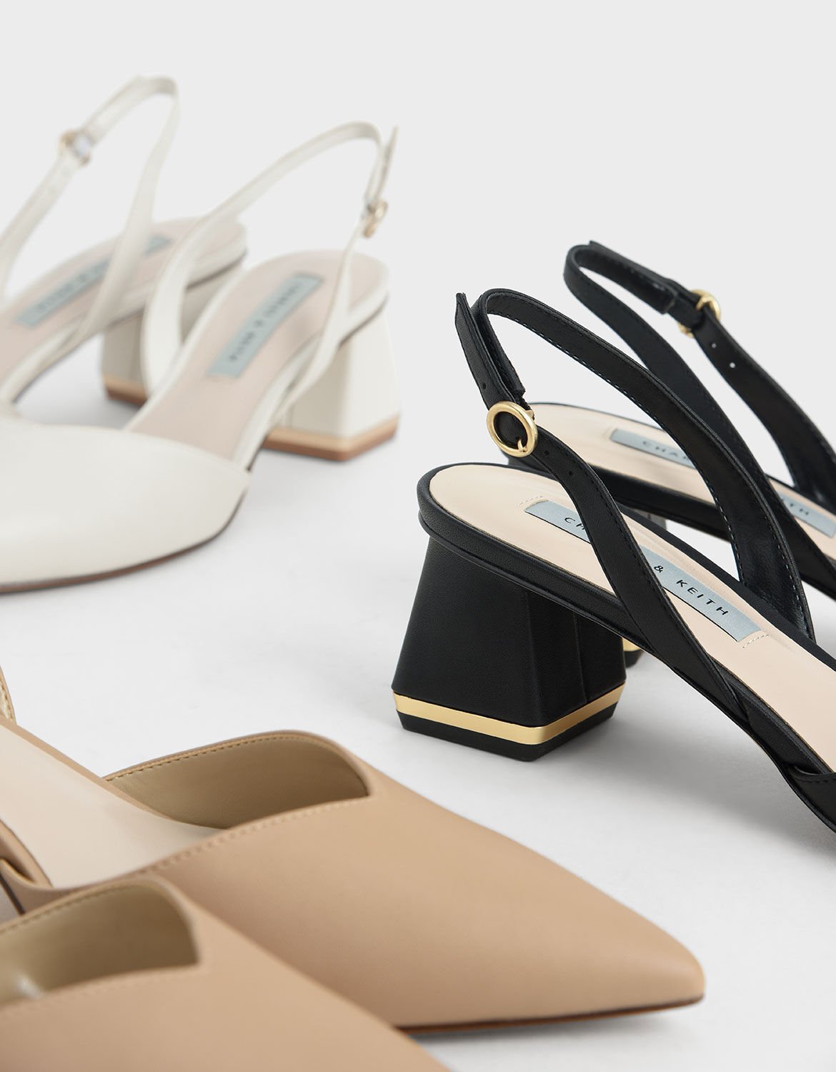 Henra splayed discount heel pumps