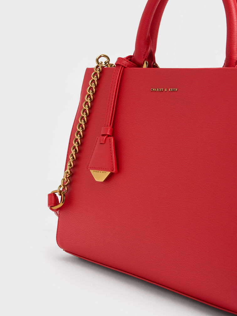 حقيبة كلاسيكية بتصميم هندسي, أحمر, hi-res