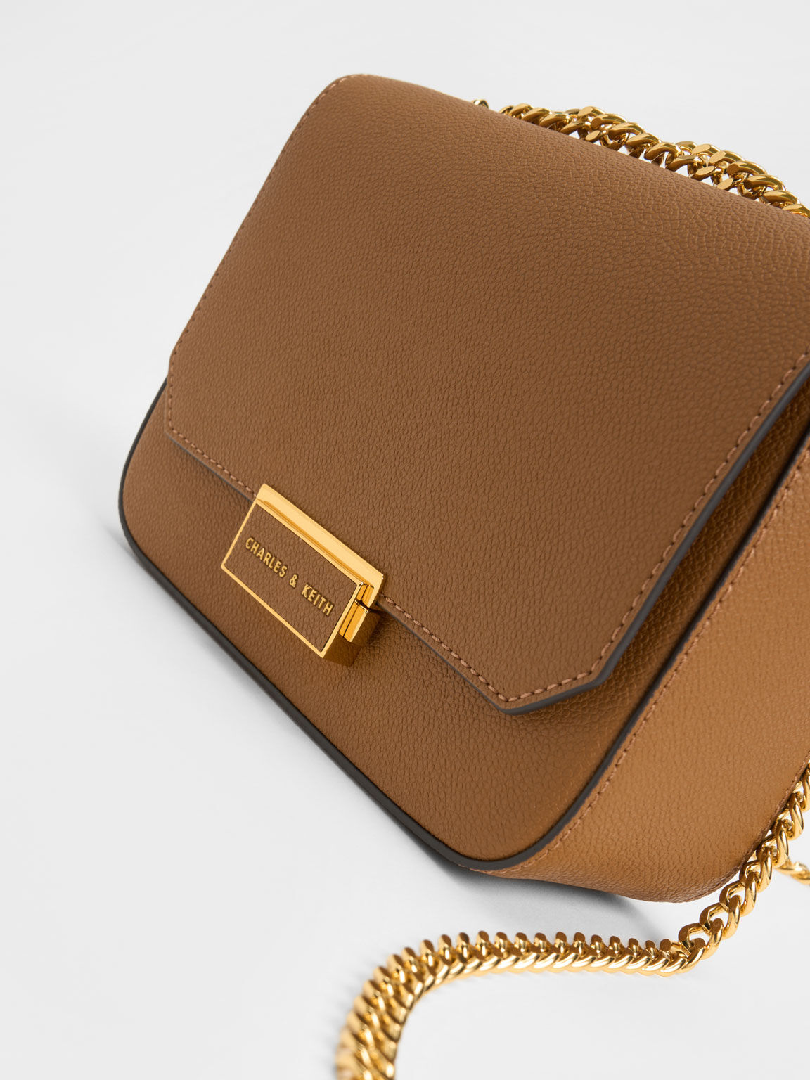 Charles and keith push lock deals chain sling bag