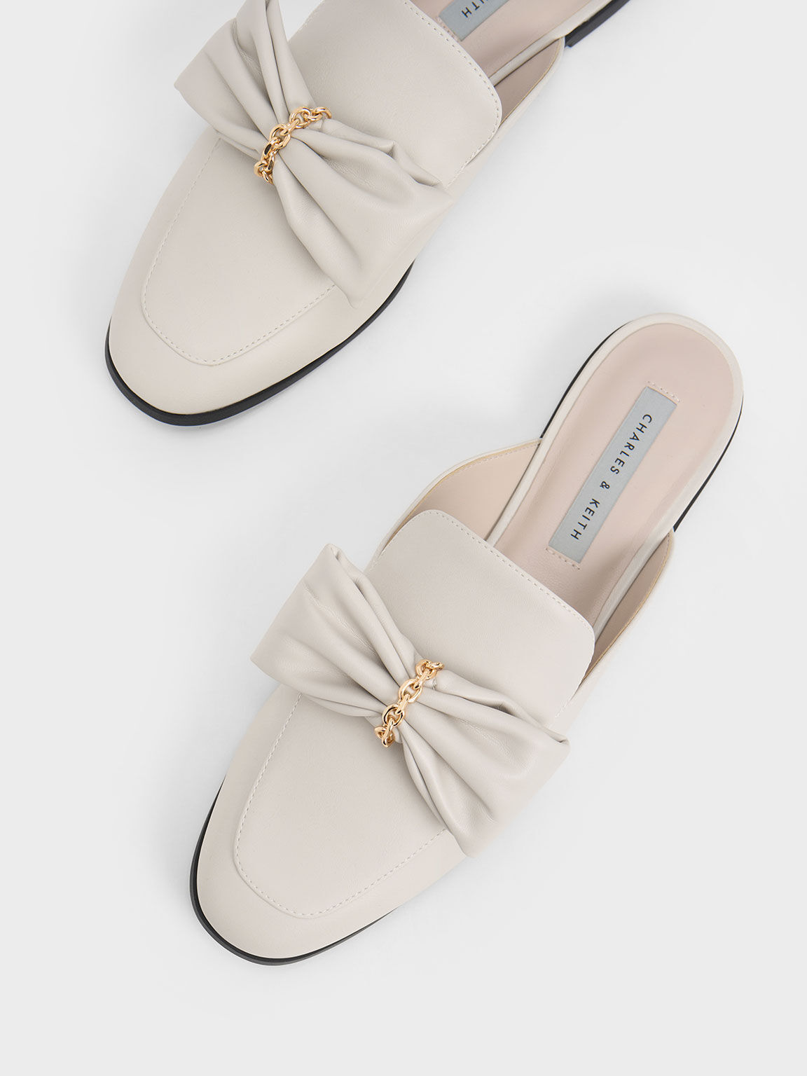 Charles and keith almond toe slip on sales