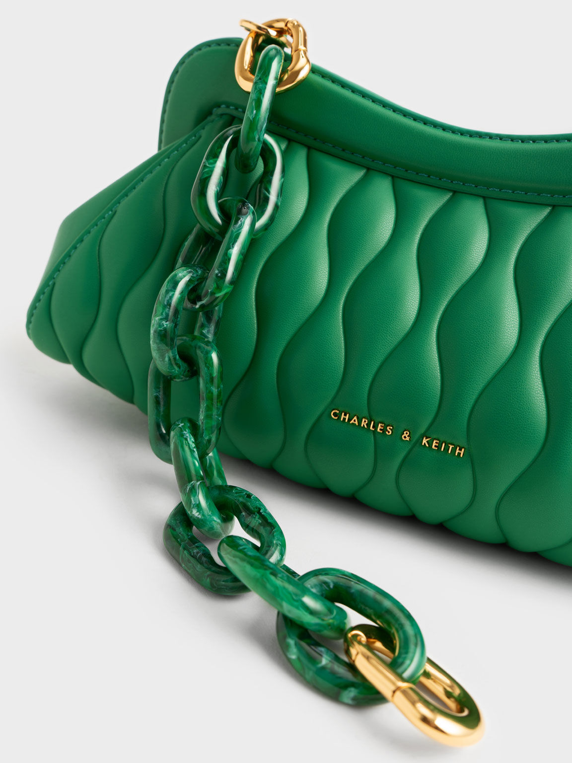 حقيبة إيفا بتصميم كلاتش وذراع أكريليك, لون أخضر, hi-res
