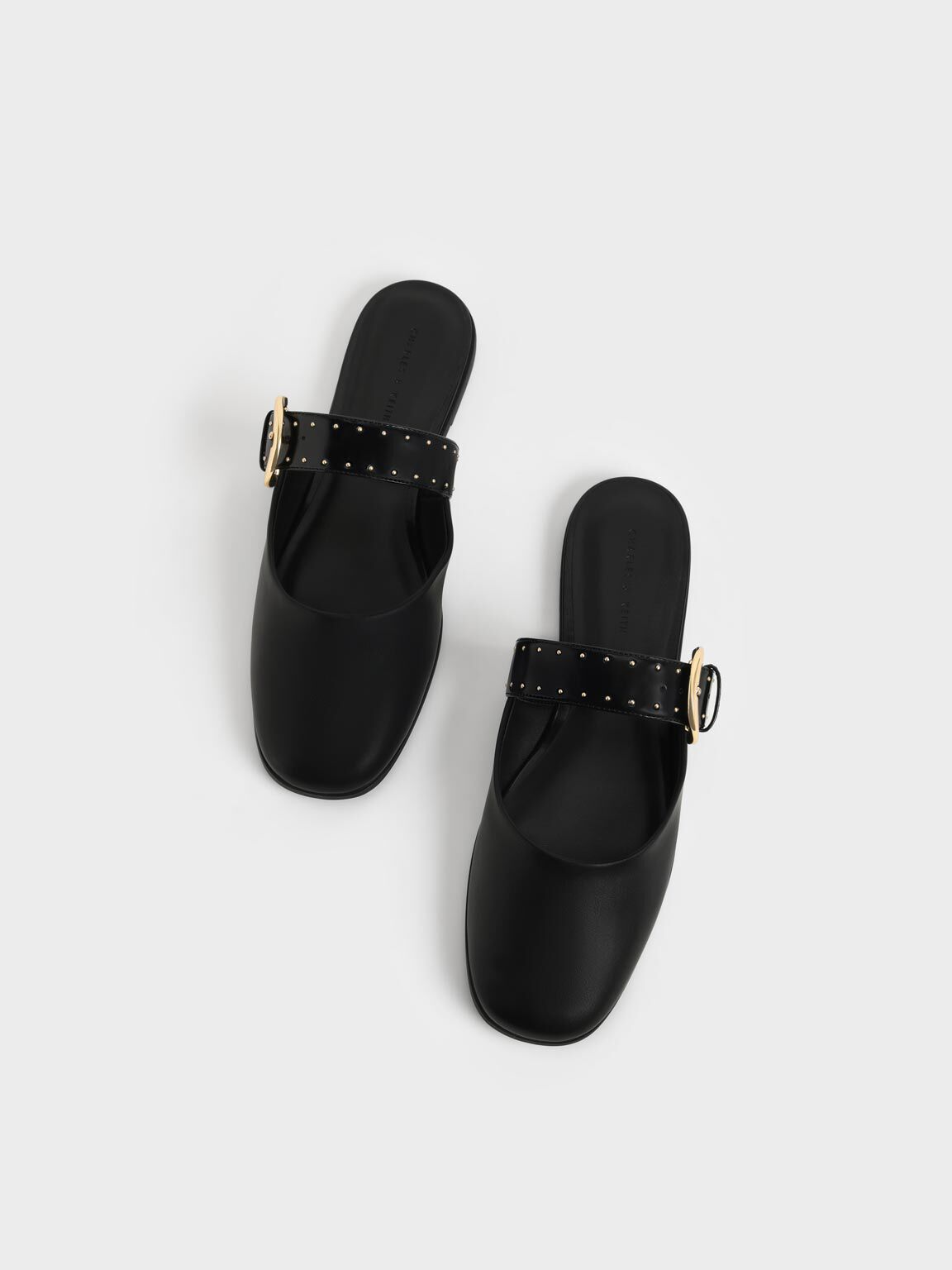 Black studded mules flat top