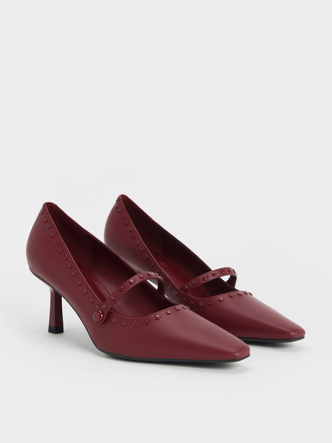 Pointed high clearance heel mules