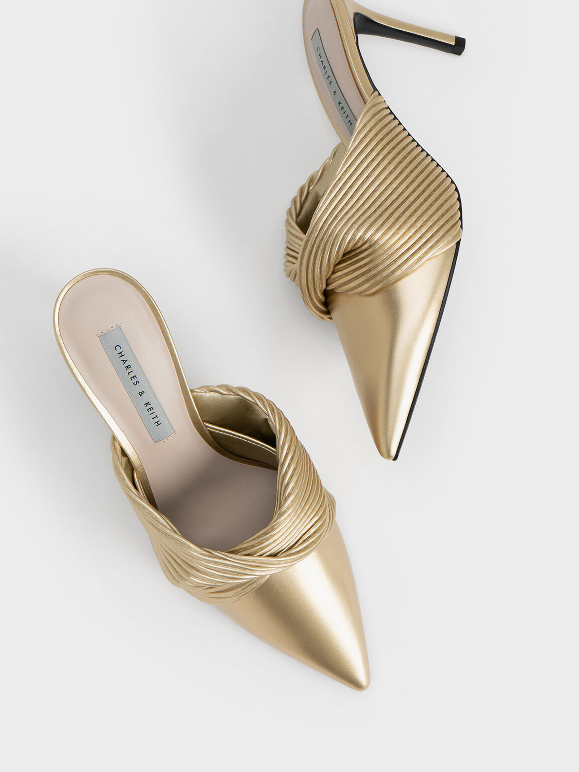 Charles and keith gold heels on sale