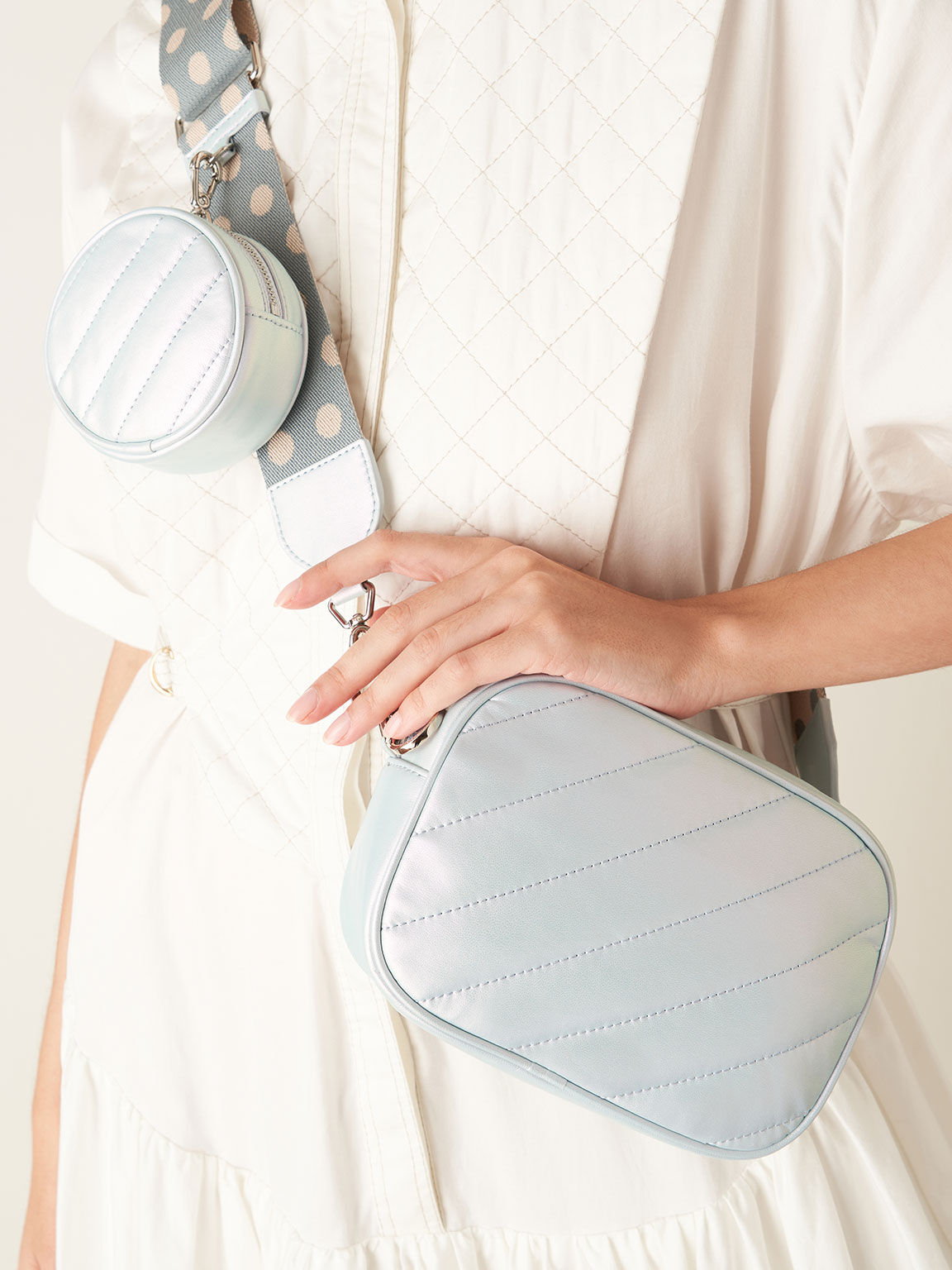 Charles and keith peacock bag online