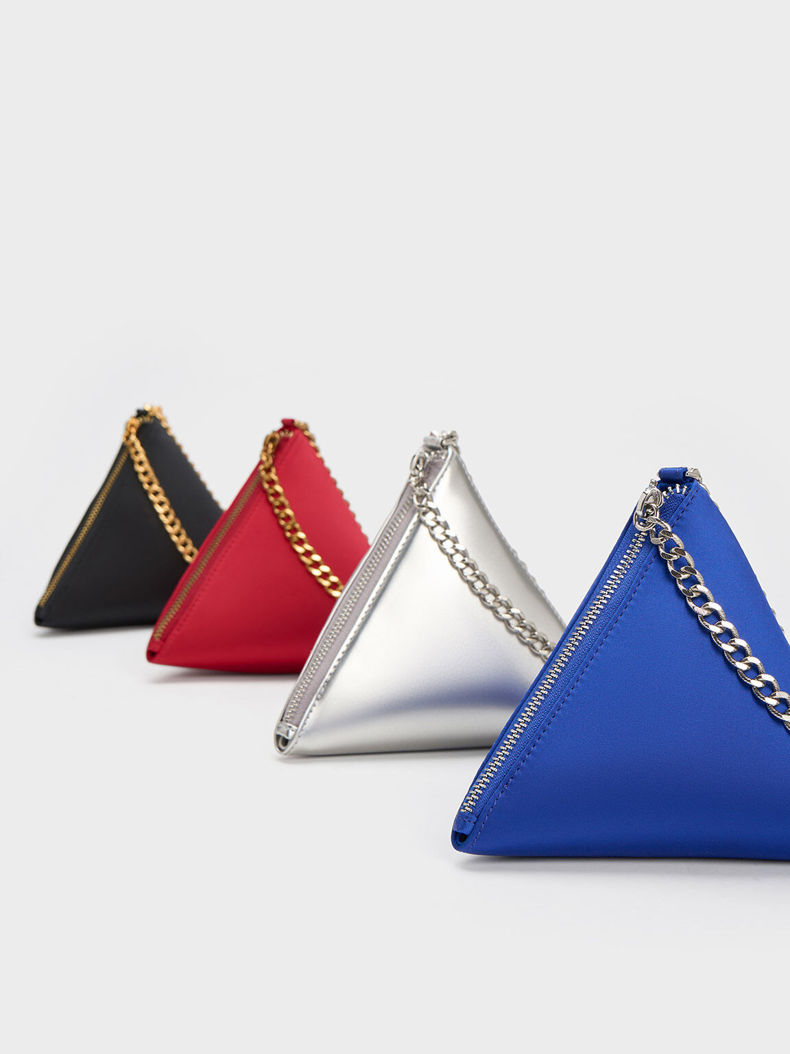 Pyramid clutch bag 2025
