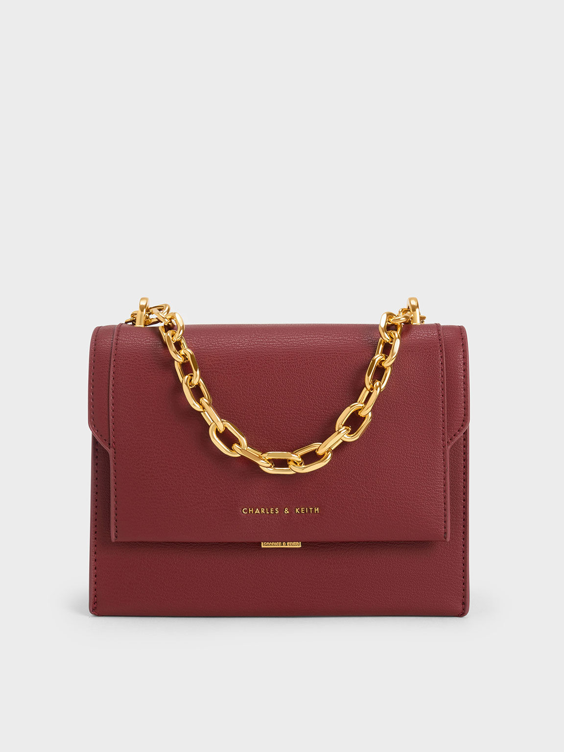 Charles and keith maroon store bag