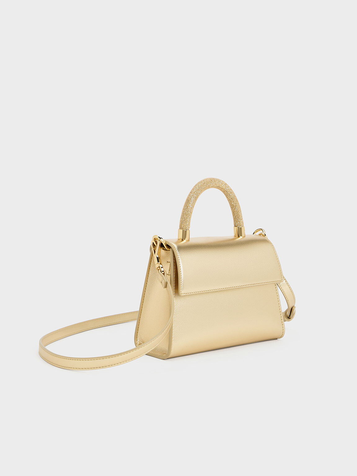 Gold top handle bag 2025