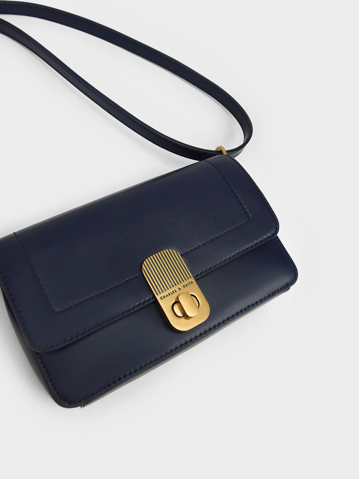 Charles and keith sales turn lock crossbody bag