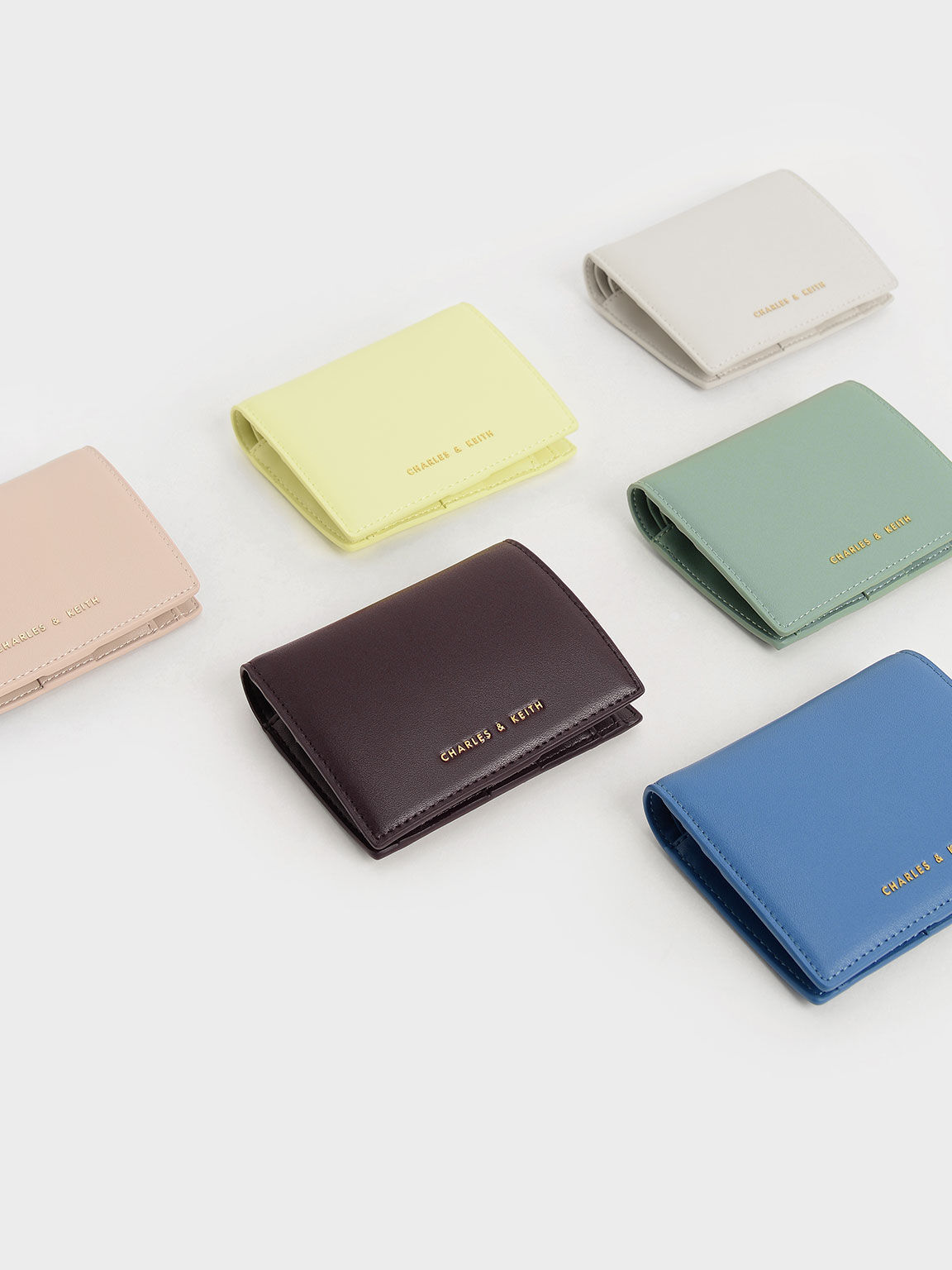 Dark Oak Evelynn Snap Button Mini Wallet - CHARLES & KEITH SA Dark Oak Evelynn Snap Button Mini Wallet - CHARLES & KEITH SA