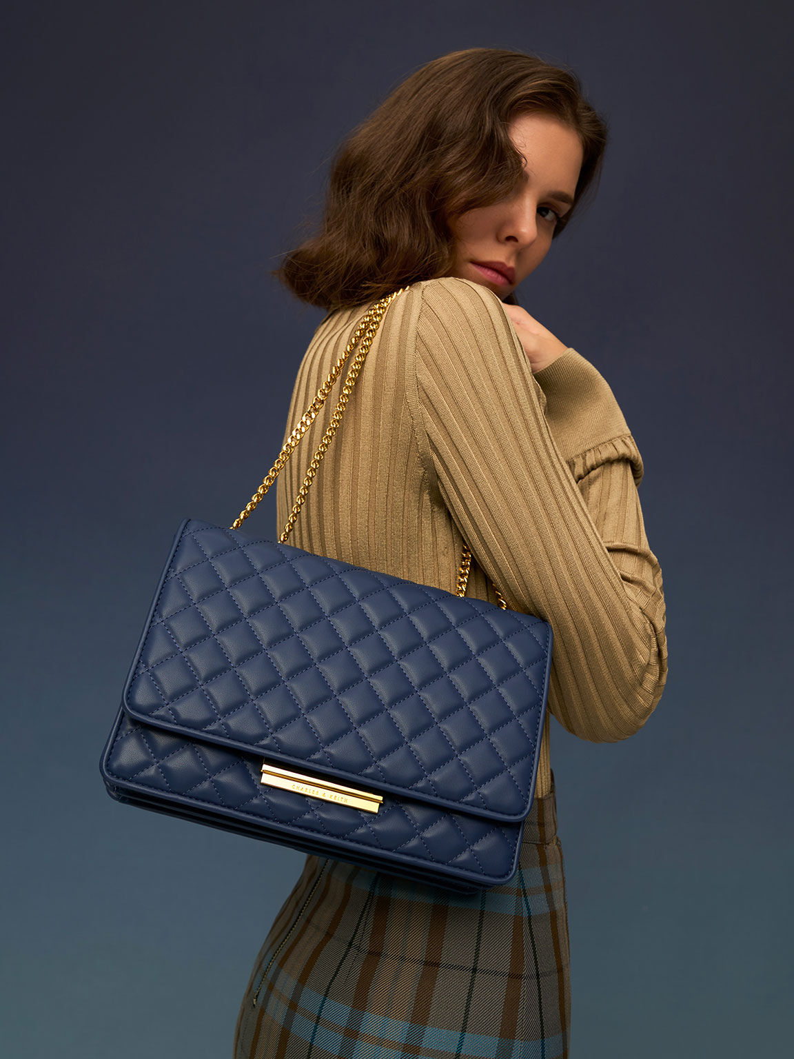 Navy quilted bag sales