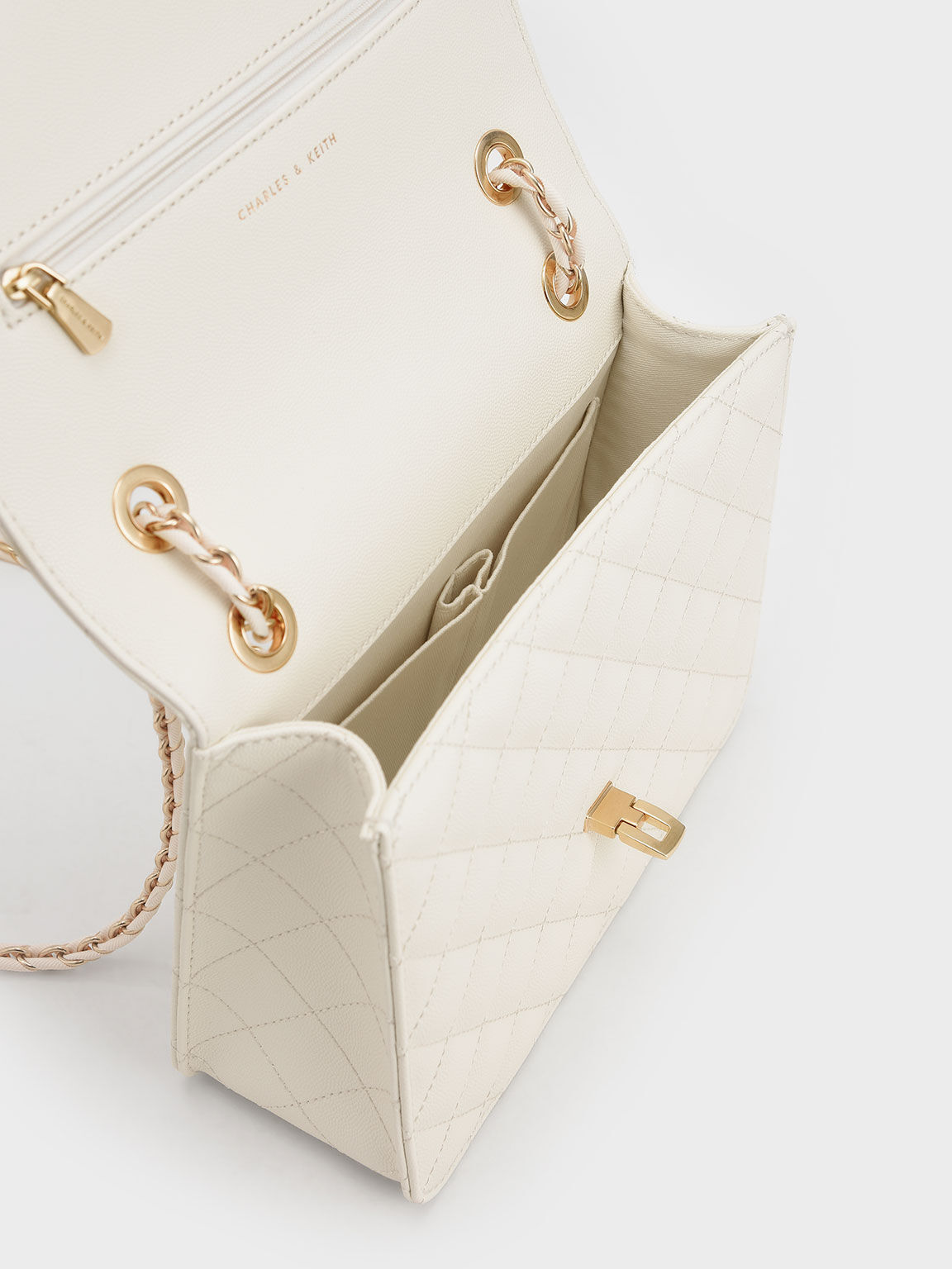 Small cream clutch bag store