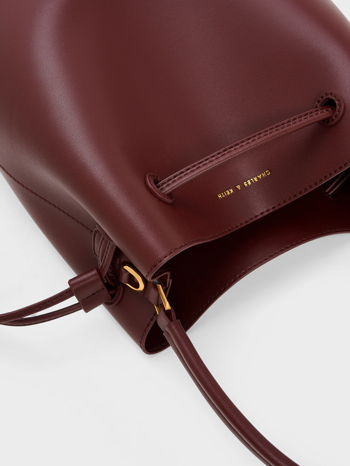 Charles and keith maroon bag on sale