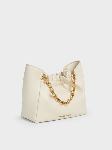 حقيبة كتف بريجيت بمقبض على شكل سلسلة وتصميم مزين بكسرات, كريم, hi-res