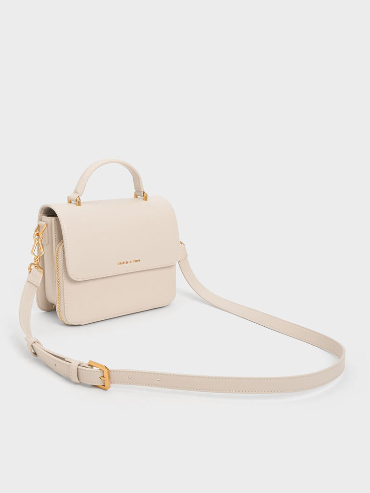 حقيبة أوكتافيا بمقبض علوي وغطاء أمامي أنيق, عاجي, hi-res