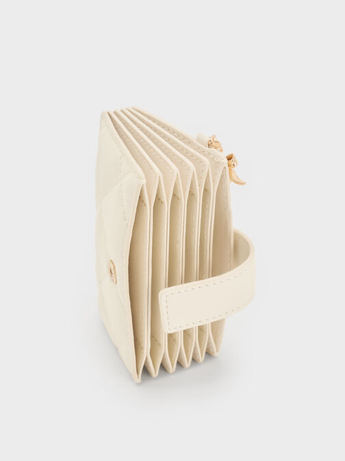 حافظة بطاقات "آرييتي" مبطنة بتطريز ومزود بقطعة جمالية على شكل قلب وفيونكة بحزام لإغلاقها, كريم, hi-res