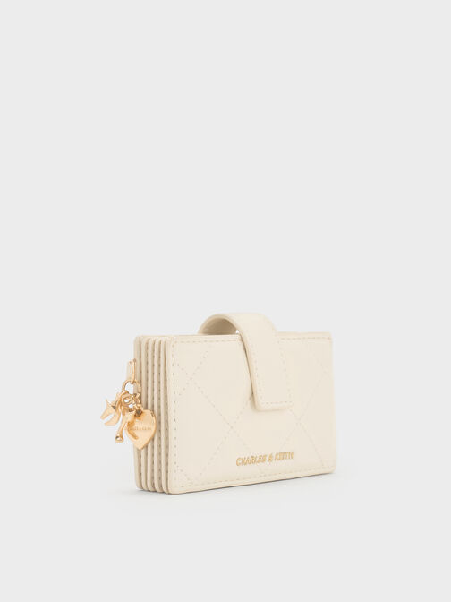 حافظة بطاقات "آرييتي" مبطنة بتطريز ومزود بقطعة جمالية على شكل قلب وفيونكة بحزام لإغلاقها, كريم, hi-res