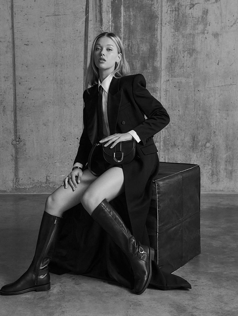 Women’s mini Gabine saddle bag and Gabine leather knee-high boots, as seen on Jess Alexander (seated in picture) – CHARLES & KEITH