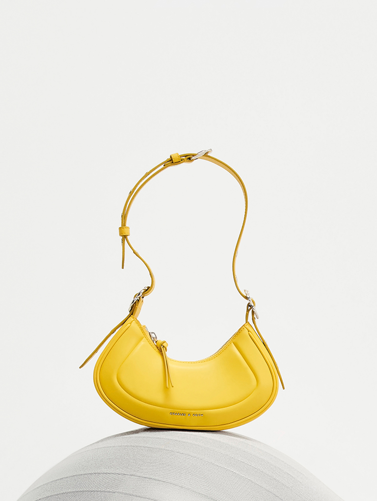 Petra Curved Shoulder Bag in yellow   - CHARLES & KEITH
