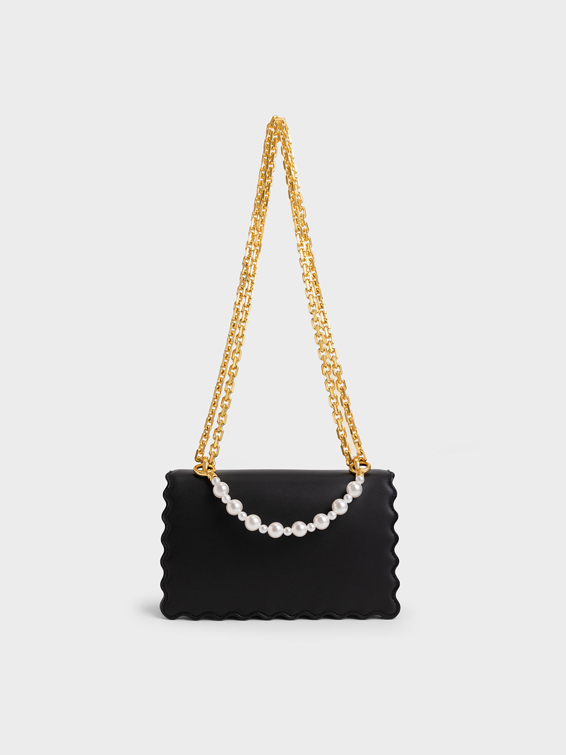 Charles and keith scallop bag online